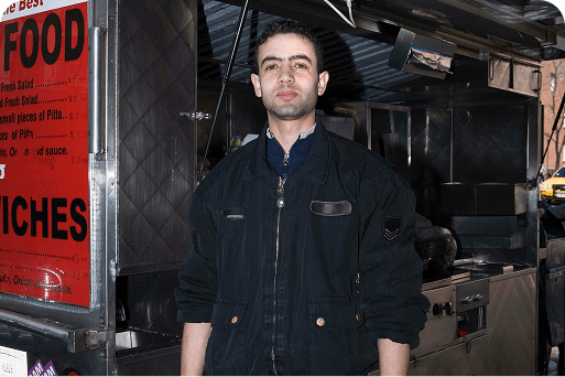Man in front of his food truck