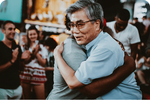People hugging at an event
